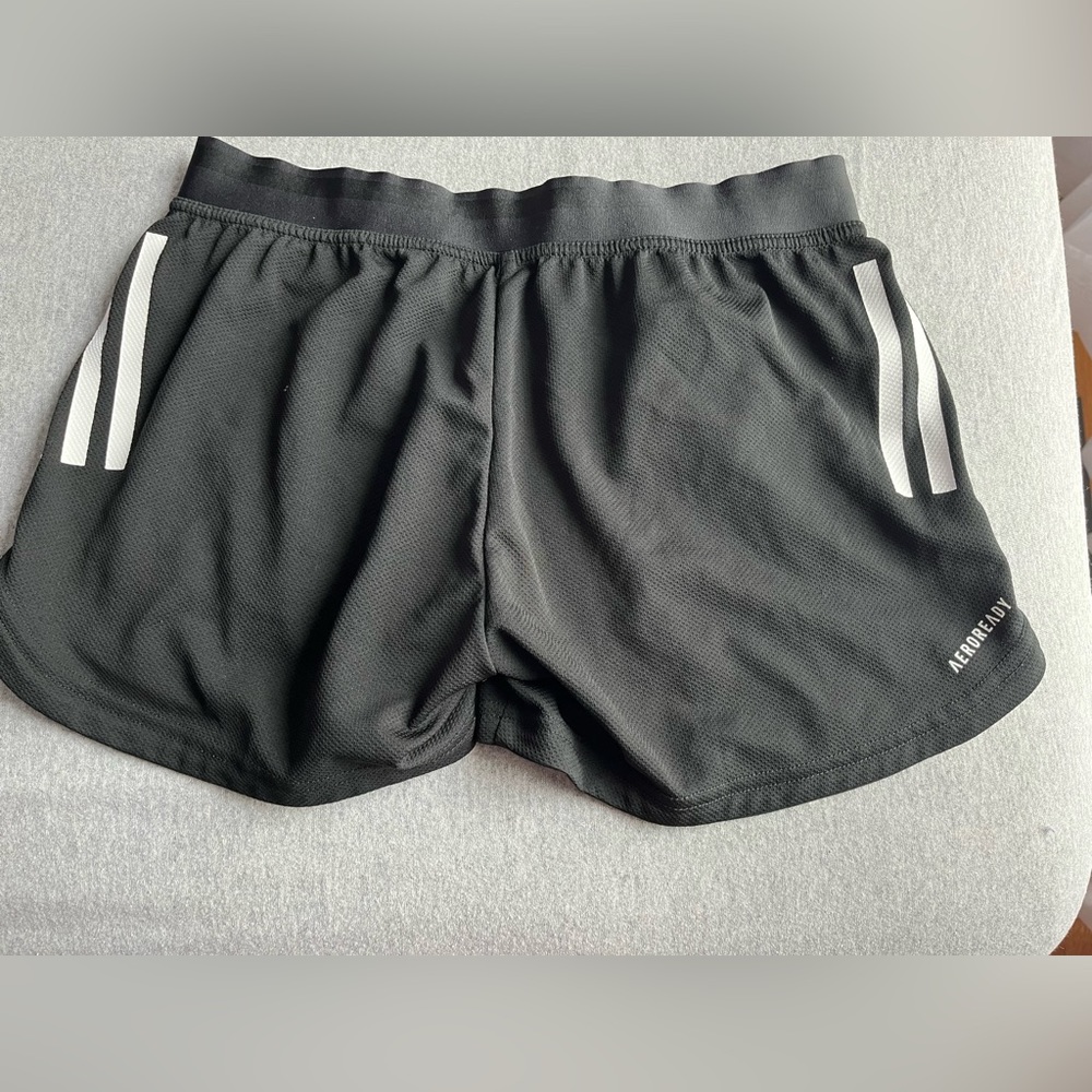 Addis’s sports shorts.